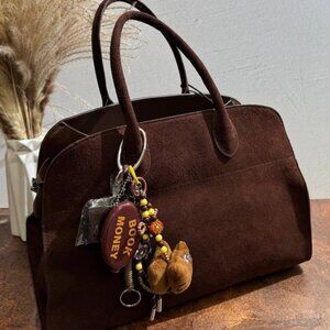 Velour Elegance – The Ultimate Italian Suede Handbag